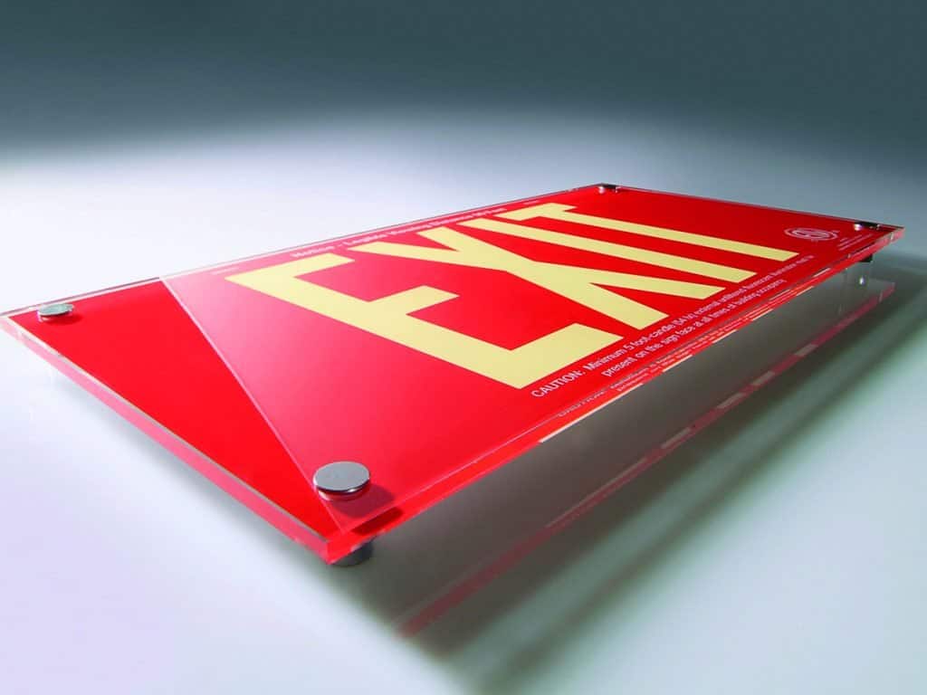 EXIT sign in plexiglass with direct UV print and standoffs — QLTY