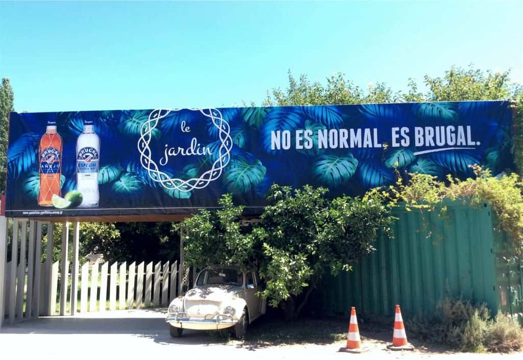 Large Brugal PVC banner on an outdoor fence, digitally printed