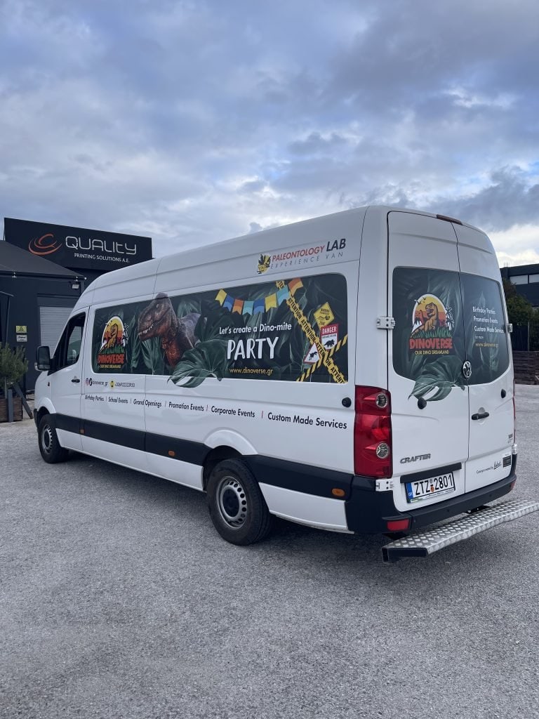 Digital print on adhesive vinyl for wrapping a corporate fleet vehicle