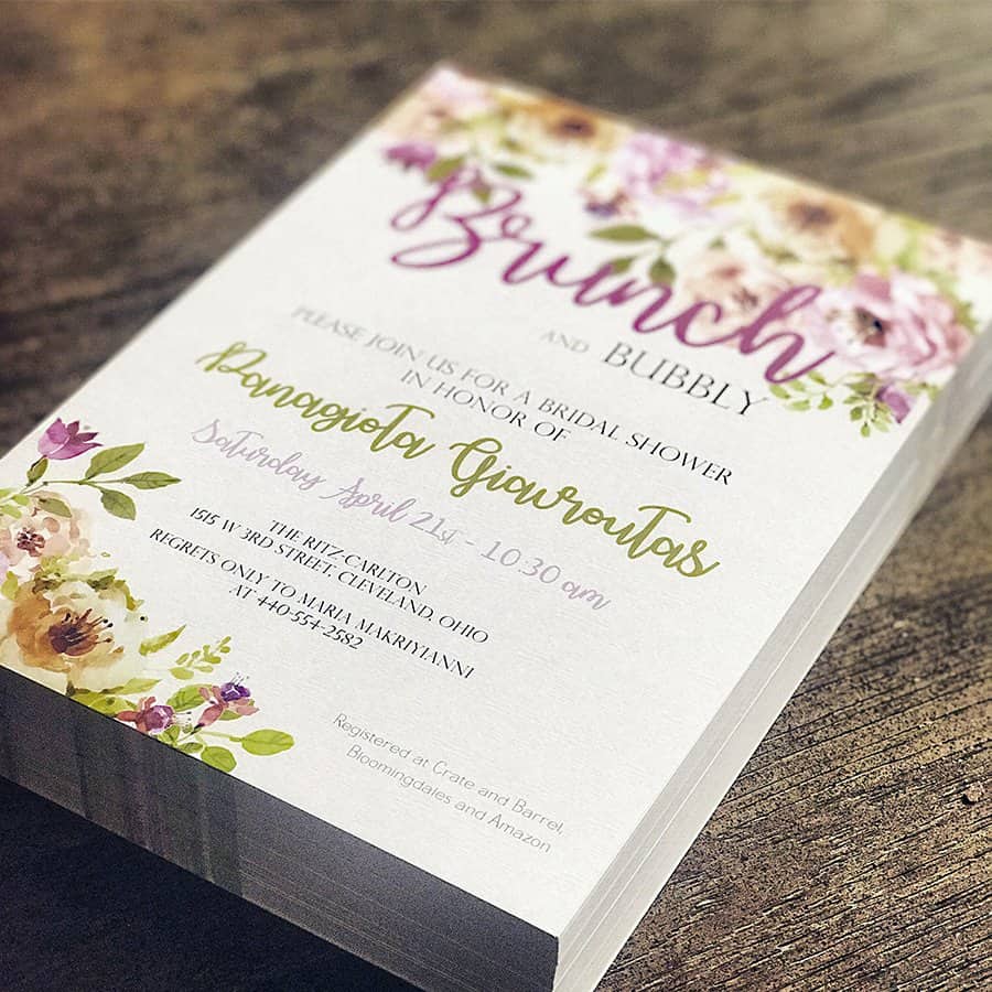 Close-up of a stack of digitally printed invitations on heavyweight paper