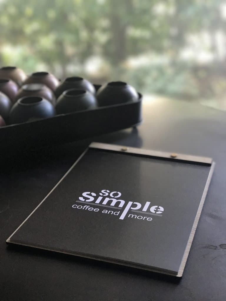Digitally printed café menu with a dark cover