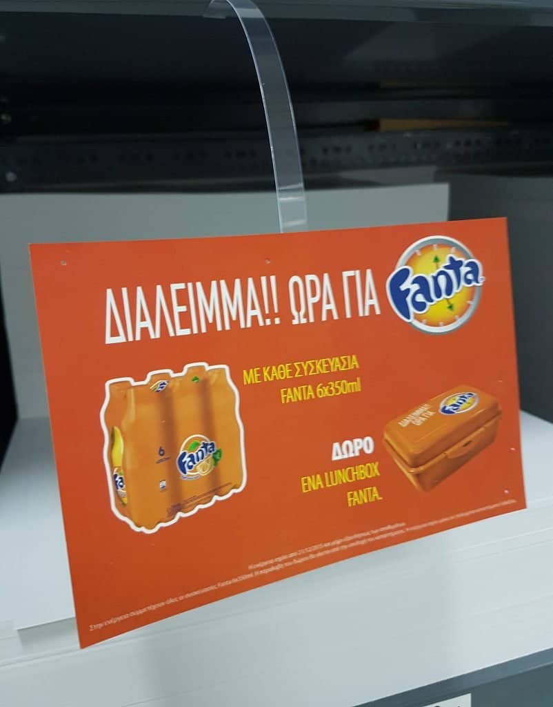 Digitally printed shelf talker on a store fridge